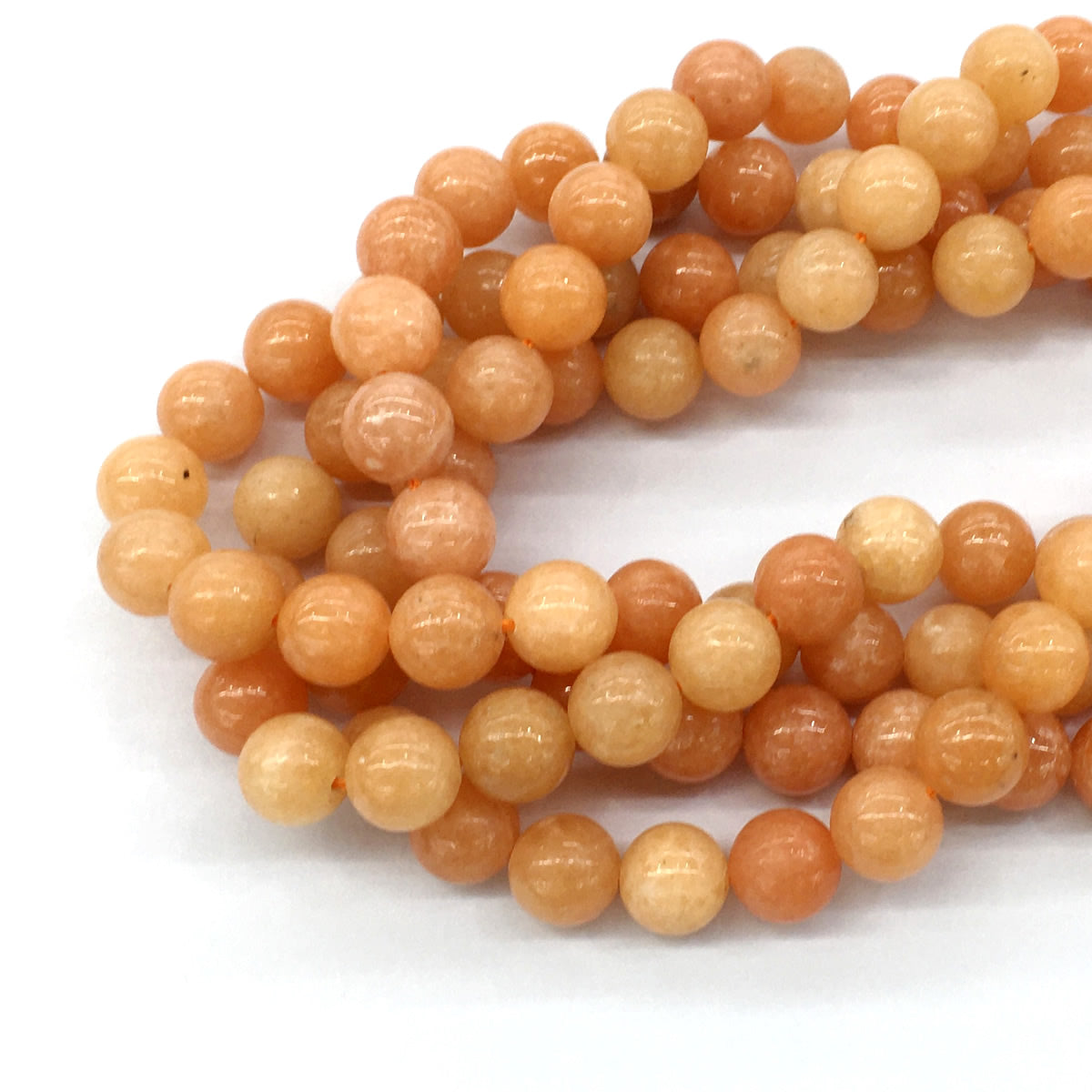 CCA15 Peach Calcite Beads Smooth Round 12mm 15.5" Strand