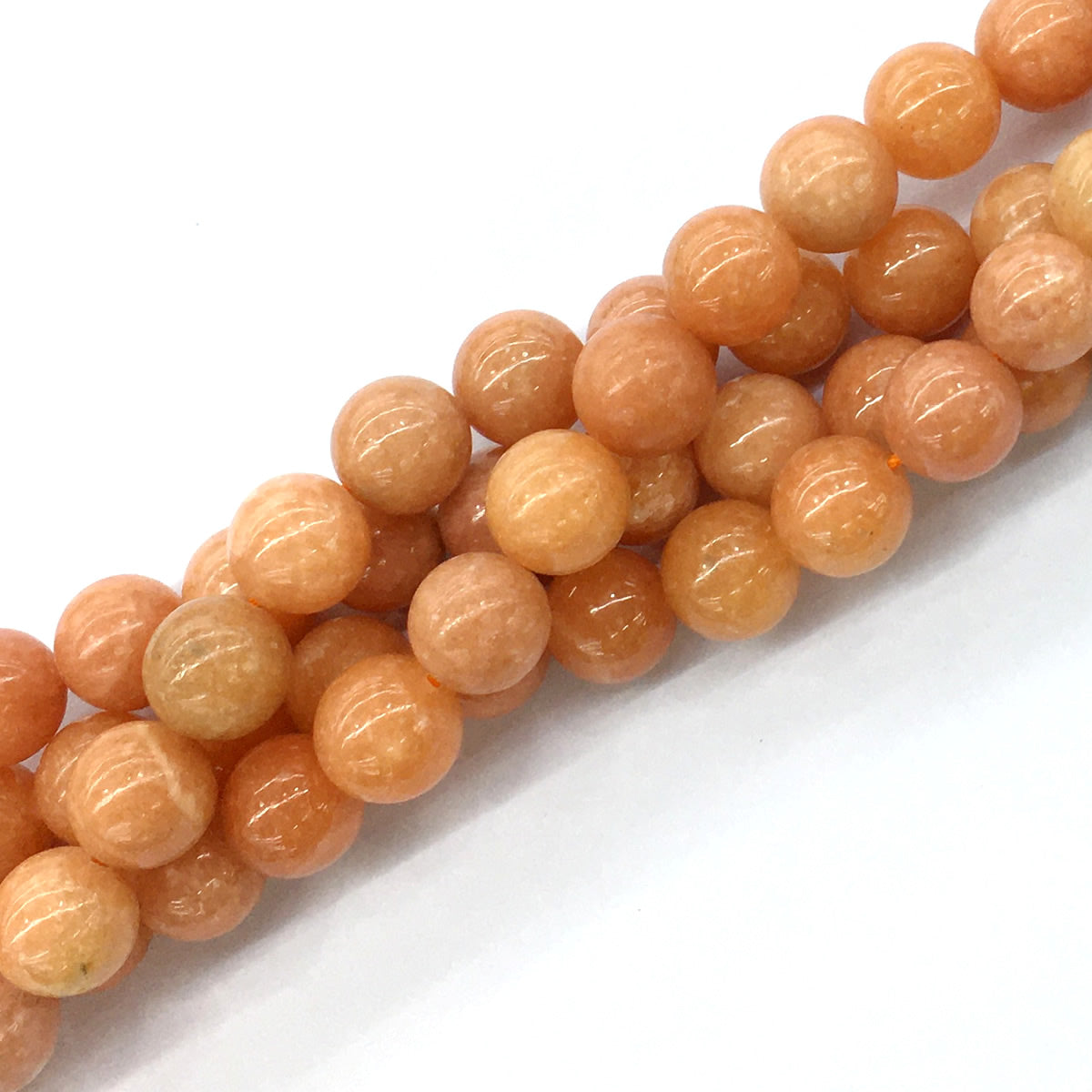 CCA16 Peach Calcite Beads Smooth Round 14mm 15.5" Strand