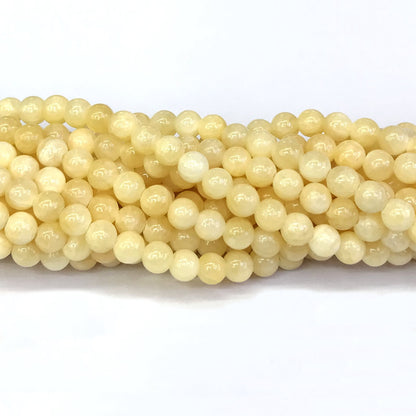 CJA130 Honey Jade Beads Smooth Round 6mm 15" Strand